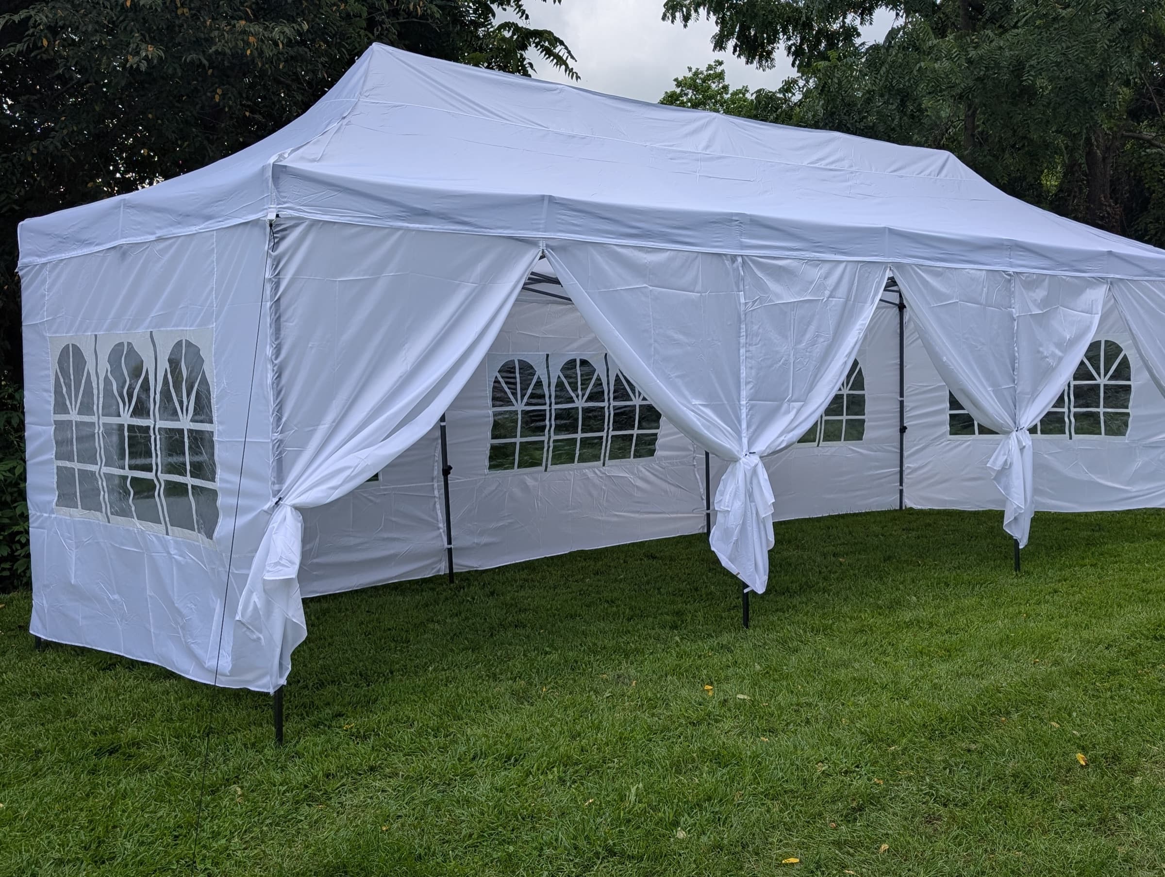 10 by 30 foot white pop-up canopy with sidewalls